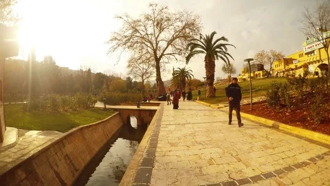 Promenade Road to Pool of Sacred Small Channel Sanliurfa Stock Footage 75412144