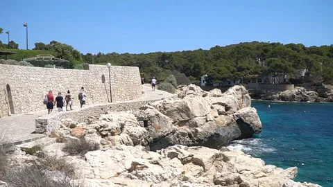 Promenade by the sea Stock Footage 128348409