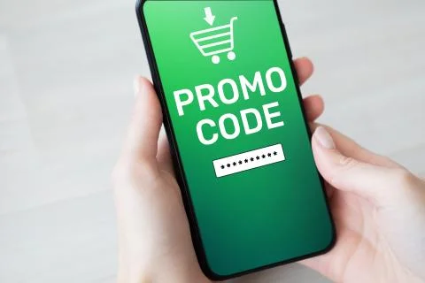 Promo code Discount coupon number field on mobile phone screen. Business and Stock Photos