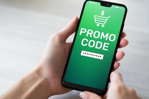 Promo code Discount coupon number field on mobile phone screen. Business and Stock Photos