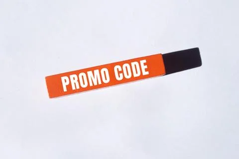 Promo Code message written on wooden block background. Conceptual Promo Cod.. Stock Photos