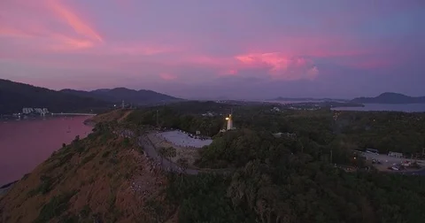 Promthep Cape Lighthouse And Viewpoint At Sunset, Phuket, Thailand, Aerial Drone Video stock 80273433