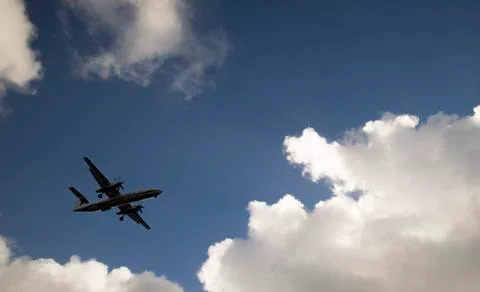 Prop Plane in Clouds Stock Photos