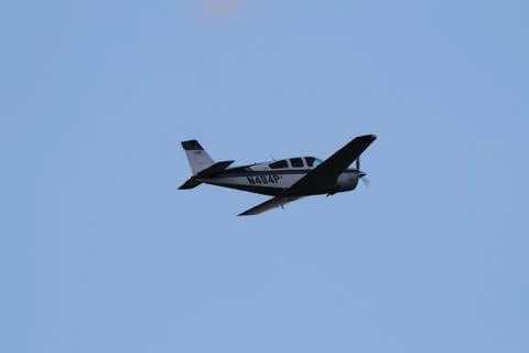 Prop plane in flight Stock Photos