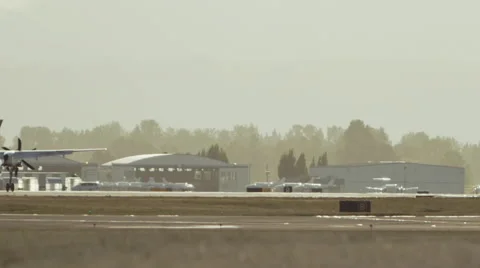 Prop Plane Landing on Runway Stock Footage 40389995