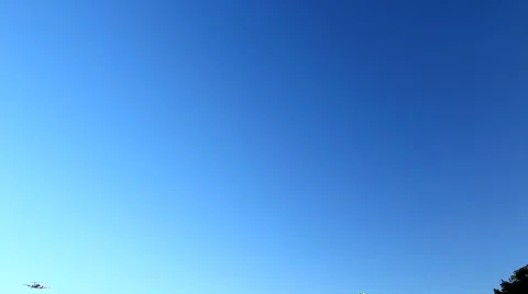 PROP PLANE LANDS THROUGH FRAME Stock Footage 948005