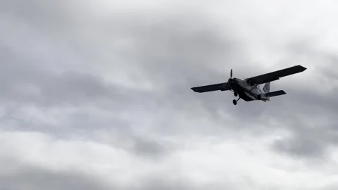 Prop Plane Soars Overhead onto Icelandic Airfield Video stock 243224178