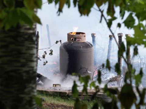Propane tank on fire Stock Photos