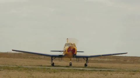 Propeler working on the bow of Yakovlev Yak-52 aircraft Stock Footage 38572587