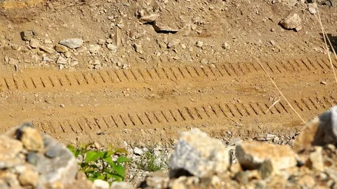Propelled crawler bulldozer pulls on a rope yellow booth Stock Footage 73136097
