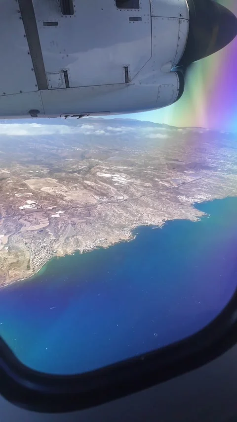Propeller airplane flying over the Canary Islands coast 库存影片 345362267
