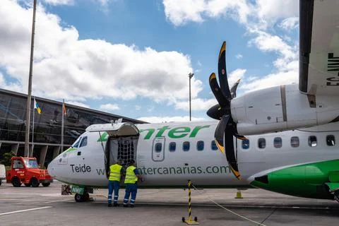 Propeller airplane provisioning on the runway, Los Rodeos Stock Photos