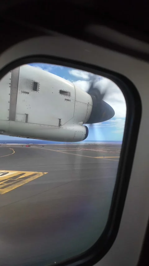 Propeller airplane taking off from Gran Canaria airport runway Stock Footage 345362251