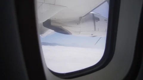Propeller airplane - view from the liner window on the engine and clouds Stock Footage 116817609