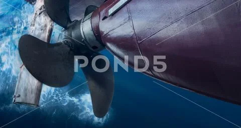 Propeller and rudder of big ship underway view from underwater. Close up imag Stock Photos