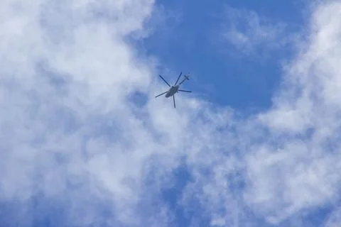 Propeller on a background of blue sky with clouds Foto stock