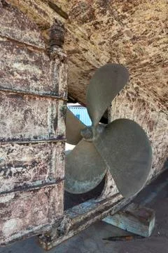 Propeller of a boat on the dry deck Stock Photos