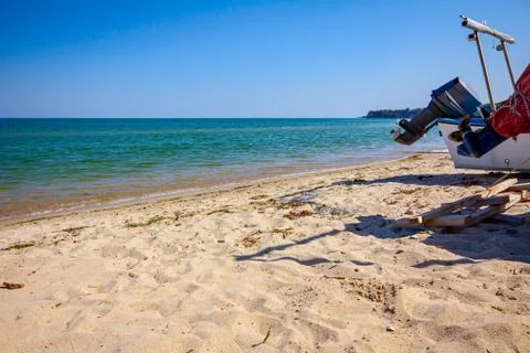 Propeller of boat on the sandy beach Stock Photos