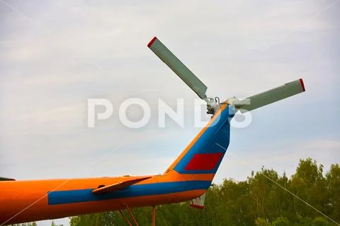 Propeller from a helicopter close-up on a background of gray sky. Stock Photos