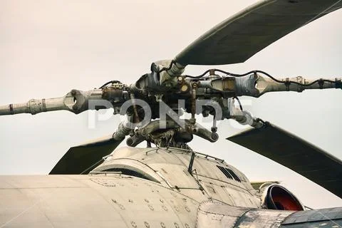Propeller from a helicopter close-up on a background of gray sky. Color tonin Stock Photos