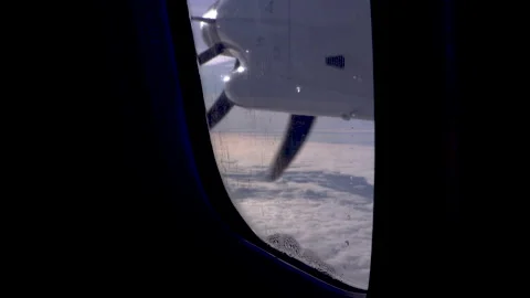 Propeller in motion in aircraft flying through the sky Video stock 142706810