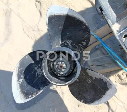 Propeller of the old disassembled boat outboard motor Stock Photos