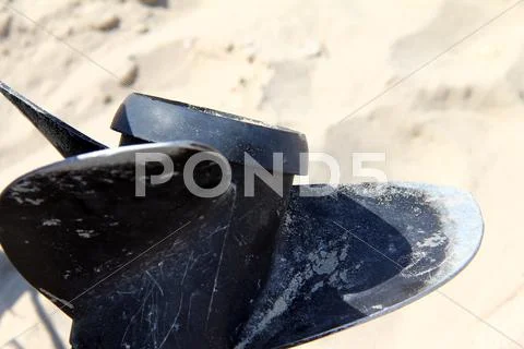 Propeller of the old disassembled boat outboard motor Stock Photos