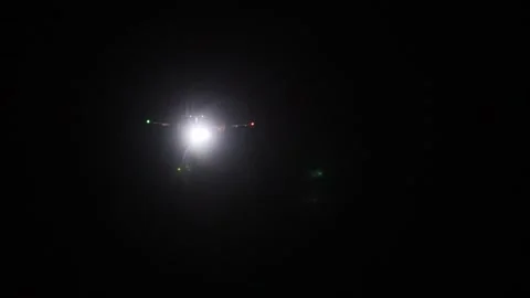 A propeller plane approaching to land at night video Stock Footage 259337126
