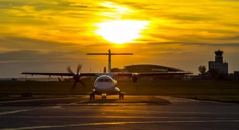 Propeller plane at sunset 스톡 사진