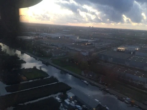 A propeller plane swoops and lands at Amsterdam airport (4K) Stock-Footage 79796446