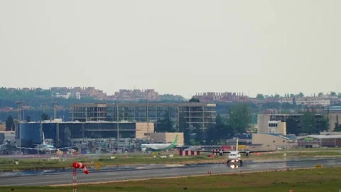 Propeller Plane Takes Off From Wet Runway Stock Footage 336730142