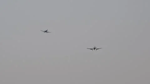 Propeller powered single engine airplanes flying for their final approach into Video stock 289294807