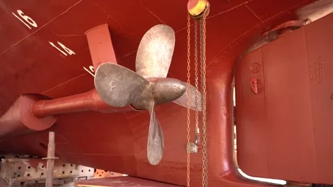Propeller of ship. Fixed pitch propeller. Vessel ashore on ship repairing yard. Stock Footage 307831799