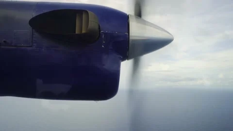 Propeller of small plane flying over vast Caribbean sea Video stock 168775281