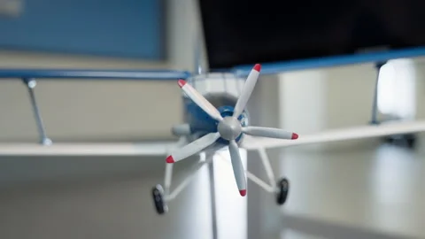 The propeller of a toy airplane close-up. Model of a two-winged aircraft. Stock Footage 241665671
