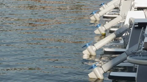 Propellers for a boat motor swing on the waves in one row in the sea, close- Vídeos de archivo 258551637