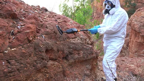 Proper protective equipment is vital when dealing with toxic environments or dan 스톡 동영상 300466840
