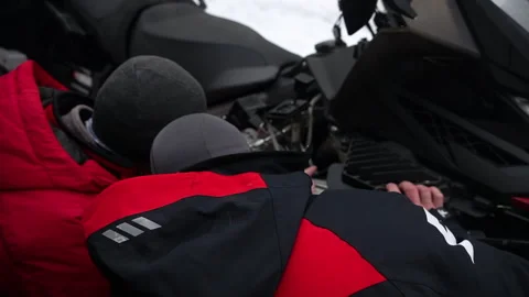 Proper Snowmobile Maintenance Practices in Extremely Cold Environmental Stock-Footage 314045405
