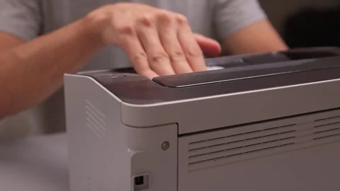 Properly Cleaning a Printer is Essential for Ensuring Optimal Performance and Stock Footage 317053977