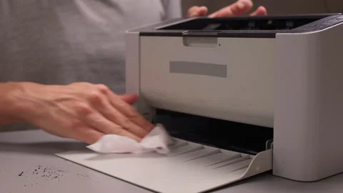 Properly Cleaning a Printer is Essential for Ensuring Optimal Performance and Stock Footage 317057008