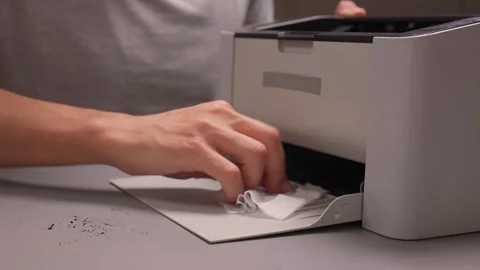 Properly Cleaning a Printer is Essential for Ensuring Optimal Performance and Stock Footage 317058373