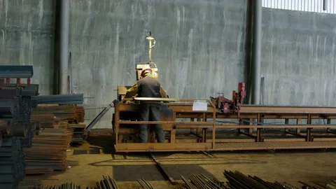 A properly equipped worker cuts the reinforcements with a professional and high Stock Footage 237218950