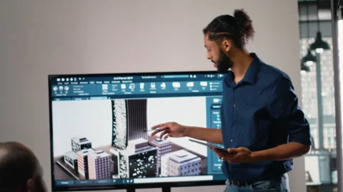 Property developer leads the planning session with 3D models for details Video stock 316794496