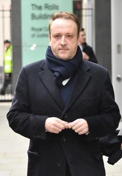 Property Developer Mark Holyoake Leaves The High Court In Central London Where H Stock Photos
