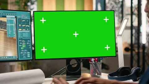 Property developer reviewing architectural blueprints with green screen Stock Footage 316642660