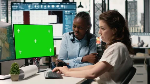 Property developer working with architectural floor plans and mockup display Stock Footage 316794839