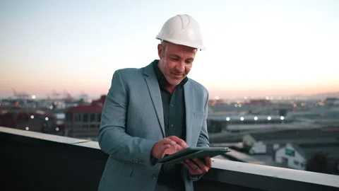 Property development, review or man on balcony with tablet, progress track or Stock Footage 337924303