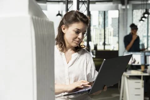 Property engineer reviewing building models for zoning regulations Stock Photos