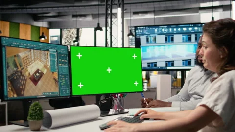 Property experts working on renovation plans with isolated screen on pc Stock Footage 316794473