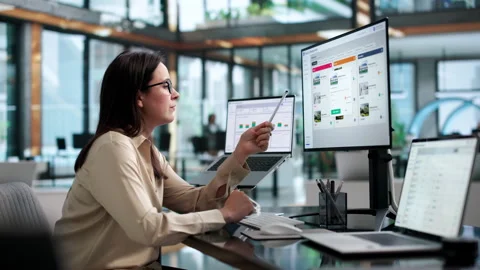 Property Manager Uses Laptop Dashboard To Track Rental Income Stock Footage 338171347
